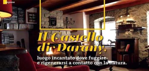 un restaurante con un cartel que dice la casita del darmaments en Castello di Darany,dimore con spa private con Jacuzzi e saune, en Villeneuve