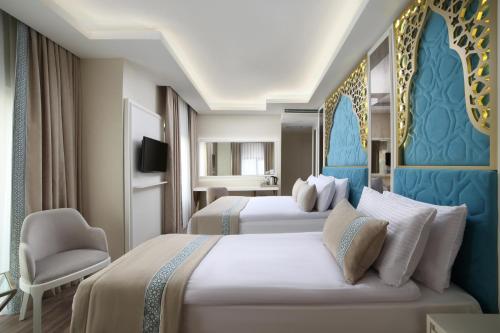 Katil atau katil-katil dalam bilik di Great Fortune Design Hotel & Spa