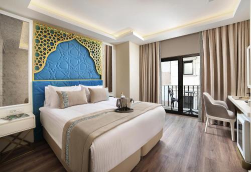 Katil atau katil-katil dalam bilik di Great Fortune Design Hotel & Spa