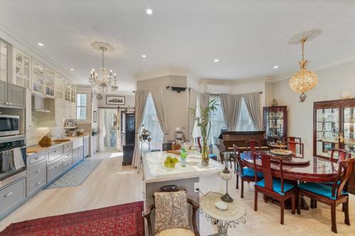 a kitchen and dining room with a table and chairs at San Francisco Retreat Just Steps from Golden Gate Park and Ocean Beach! home in San Francisco