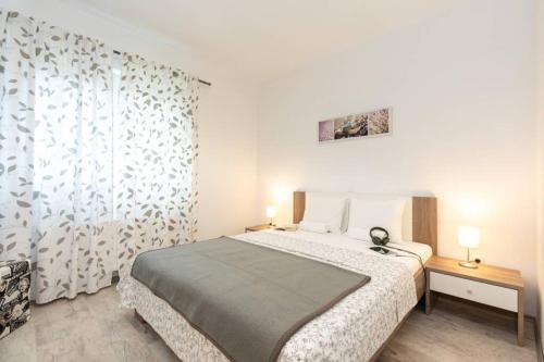 Posteľ alebo postele v izbe v ubytovaní Apartments Doris, Krk