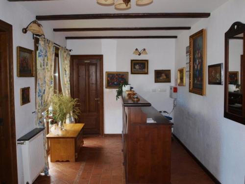 a kitchen with a counter top in a room at Pensiunea Casa Motului in Arieşeni
