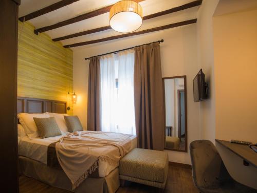 Cama o camas de una habitación en Los Tinajones