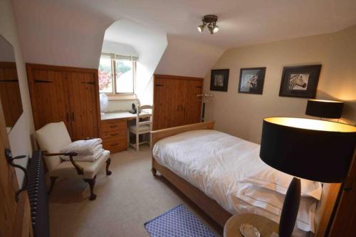 Cama o camas de una habitación en The Old Manor Coach House