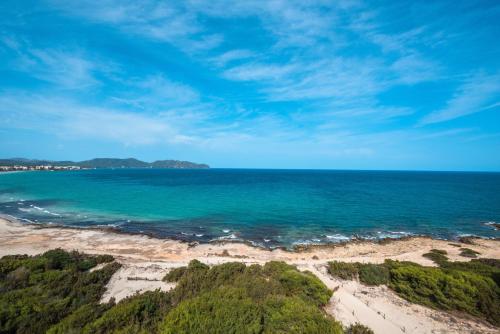 a view of the ocean from a beach at Iberostar Waves Cala Millor - Adults Only in Cala Millor