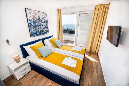 Ένα ή περισσότερα κρεβάτια σε δωμάτιο στο Luxury Villas Anita with Private Pool