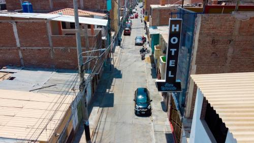 an overhead view of a city street with a car at Hotel Jose Ignacio Chepen in Chepén