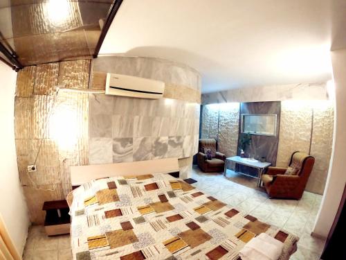 Postel nebo postele na pokoji v ubytování Hotel Garant