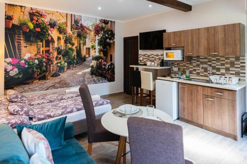 Η κουζίνα ή μικρή κουζίνα στο Allium Apartment