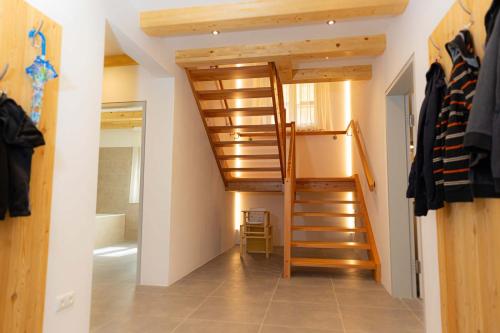 a staircase leading to a room with a bathroom at Ferienhaus Schilcherland in Hochneuberg