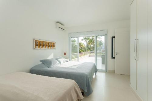Postel nebo postele na pokoji v ubytování Mansão com piscina e área gourmet em Caraguatatuba