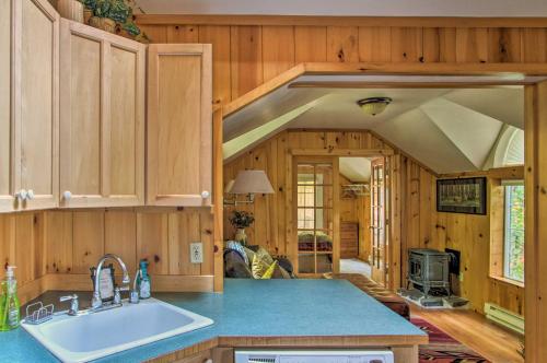a kitchen with a sink and a counter top at Elk Hideaway Ashford Cottage with Hot Tub! in Ashford