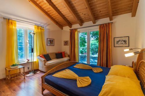 Postel nebo postele na pokoji v ubytování Villa ARTE-ŠHAM