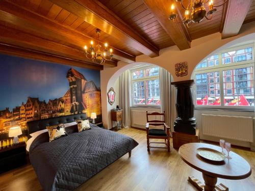 Posteľ alebo postele v izbe v ubytovaní Apartamenty MICHEL Gdańsk Centrum BOUTIQUE HOTEL