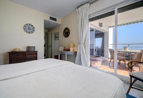 Postel nebo postele na pokoji v ubytování Penthouse Boulevard 401