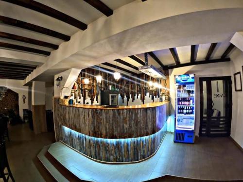 Ο χώρος του lounge ή του μπαρ στο Hotel Garant