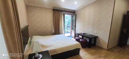 Voodi või voodid majutusasutuse Ruzan hotel toas