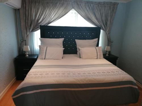 Katil atau katil-katil dalam bilik di JB Countrylife Accommodation
