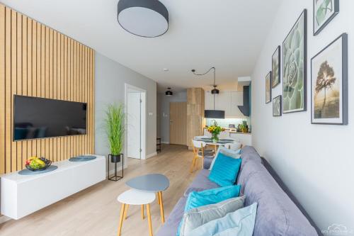 Seaway Apartments - Miodowy Dom - Kołobrzeg tesisinde bir oturma alanı