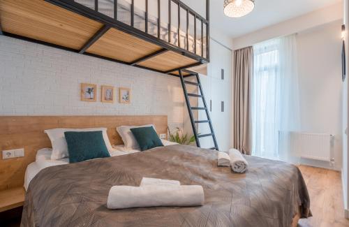 Postel nebo postele na pokoji v ubytování 2-room apartment, Redco, Alpic 405