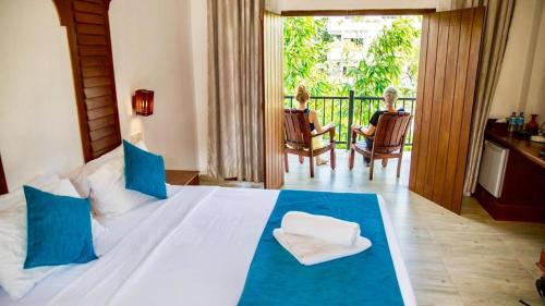 Krevet ili kreveti u jedinici u objektu Sundaras Resort & Spa Dambulla