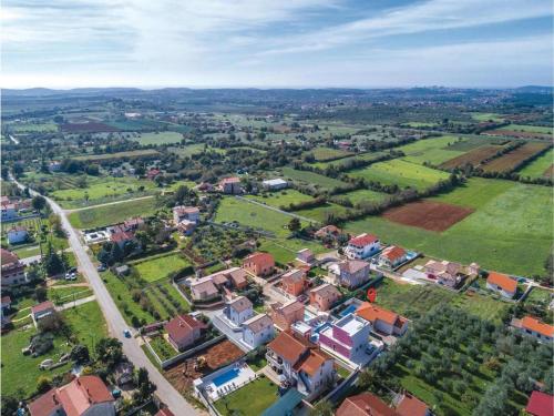 an aerial view of a town with houses and trees at Holiday house Vedrana, Jadreški in Pula