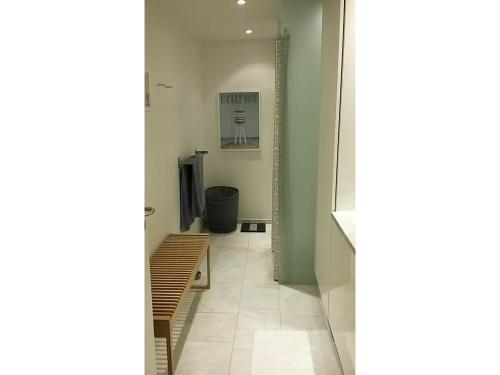 a hallway with a room with a basketball hoop on the wall at ApartmentInCopenhagen Apartment 625 in Copenhagen