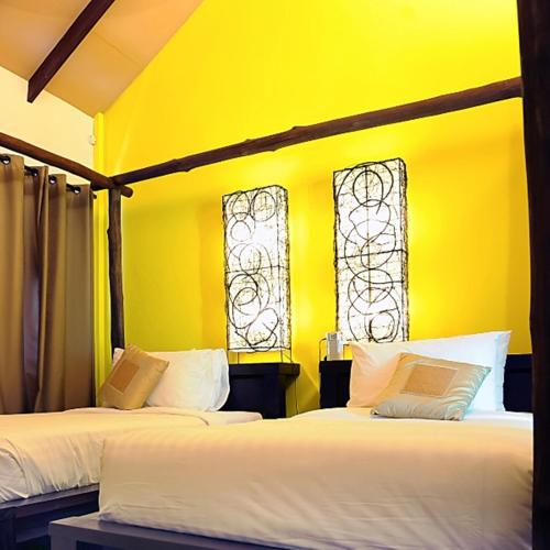 Katil atau katil-katil dalam bilik di The Village House