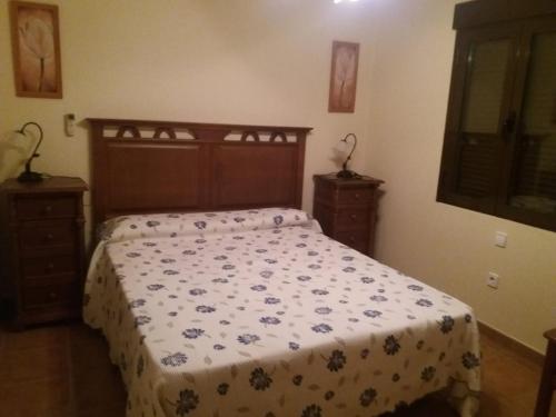 Un pat sau paturi într-o cameră la Casa Rural las Escuelas I