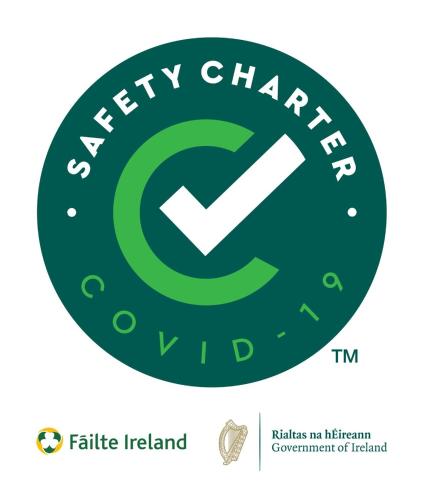a logo for a fertility charity therapy facility at The Village Hotel, Bar and Restaurant in Bettystown