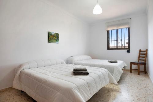 Postel nebo postele na pokoji v ubytování Casa Isabel