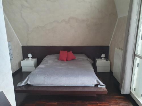 Krevet ili kreveti u jedinici u objektu Milano Malpensa Grandi Mansarda Attico