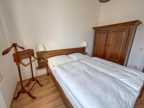 Cama o camas de una habitación en Apartmány Klášterní 84