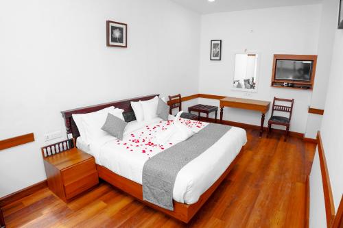 Postel nebo postele na pokoji v ubytování MPSROYALSUITES