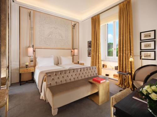 Ένα ή περισσότερα κρεβάτια σε δωμάτιο στο Hotel Eden - Dorchester Collection
