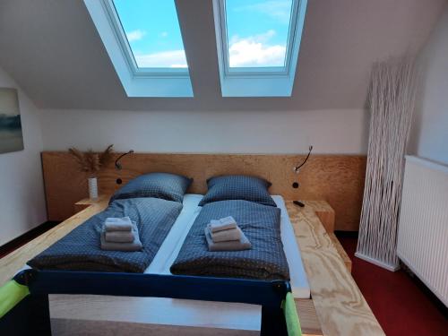 Ein Bett oder Betten in einem Zimmer der Unterkunft Appartement Am Salzbergtal