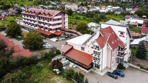 an overhead view of a town with buildings at Hotel Eden in Câmpulung Moldovenesc