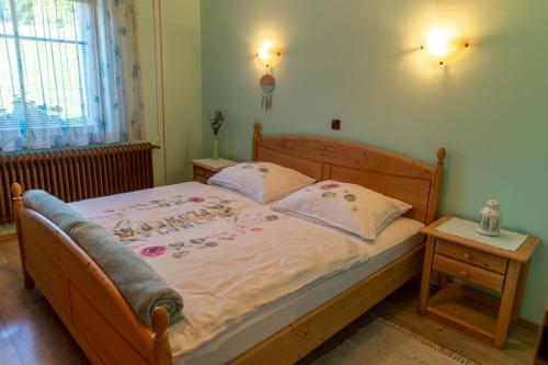 Ліжко або ліжка в номері Apartma Gaby