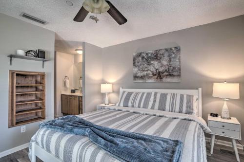 a bedroom with a bed and a ceiling fan at Modern Port St Lucie Home with Private Outdoor Oasis in River Park