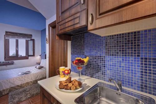 Postel nebo postele na pokoji v ubytování Hotel Petradi
