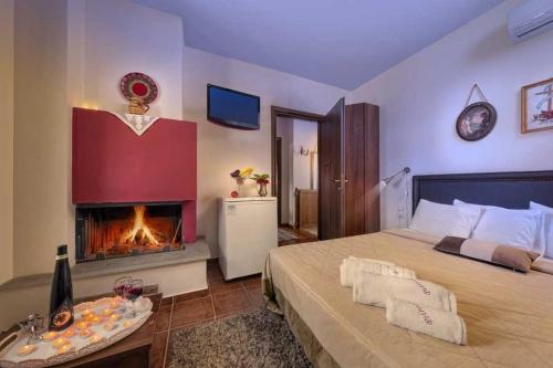 Postel nebo postele na pokoji v ubytování Hotel Petradi