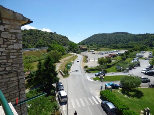 a view of a street with cars parked at Casetta delle Terme in Rapolano Terme