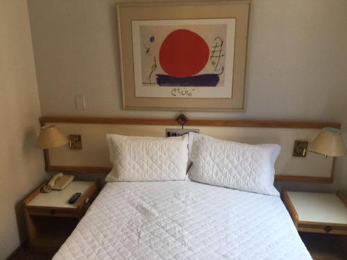 Cama o camas de una habitación en Flat Golden Plaza - Lourdes