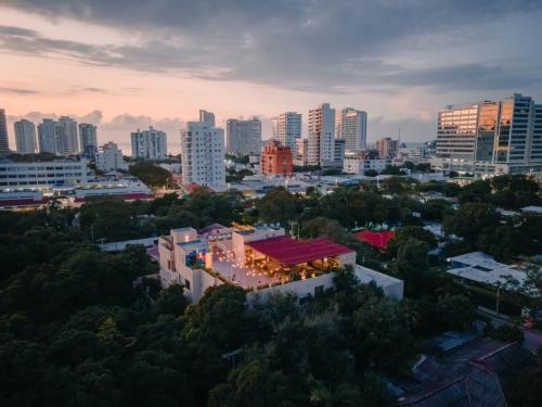 an aerial view of a city with buildings at Viajero Santa Marta Hostel in Santa Marta