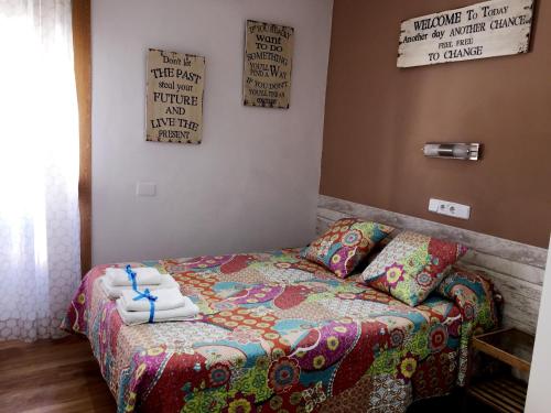 Cama o camas de una habitación en Alojamiento Jaén