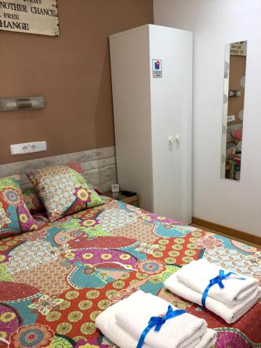 Cama o camas de una habitación en Alojamiento Jaén