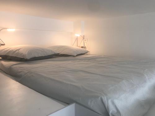 Superbe appartement 4 Personnes au Centre de Paris tesisinde bir odada yatak veya yataklar