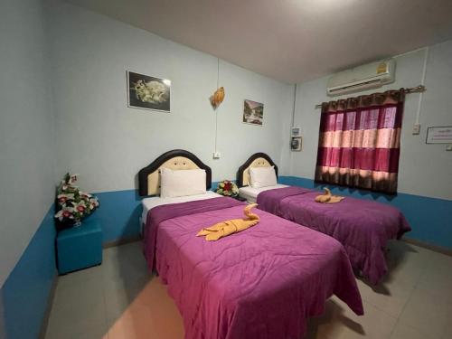 Postel nebo postele na pokoji v ubytování Diamond Resort