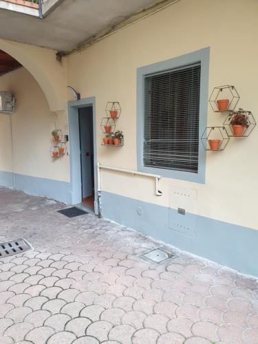 a building with a window and a door at ROMEO2 in Somma Lombardo