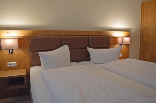 Aparthotel Jägerhausにあるベッド